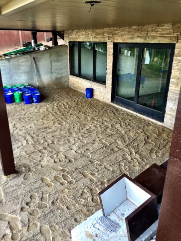The beginnings of the patio; limestone and sand base